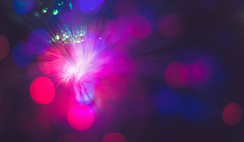 Flashing lights of purple, blue and green