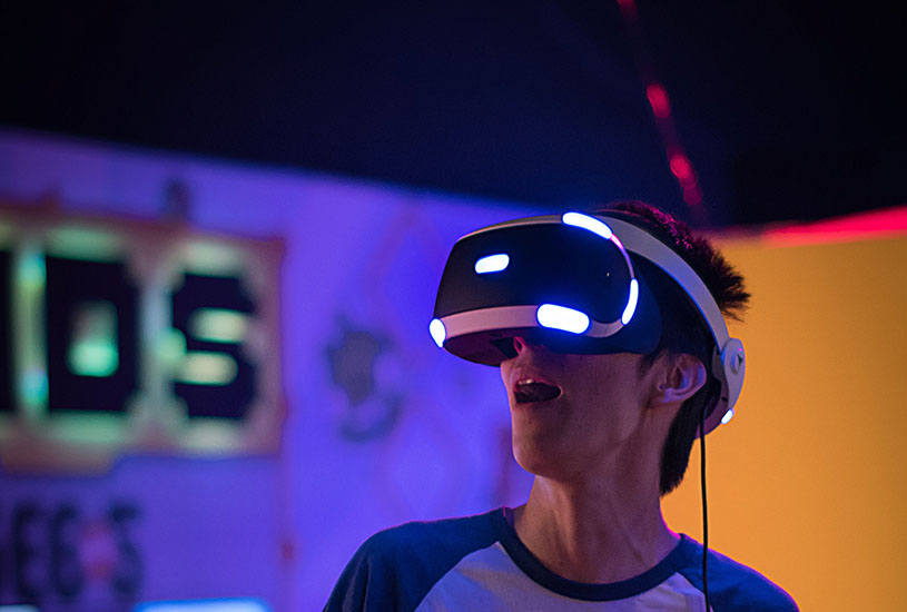 Person wearing vr mask looking surprised