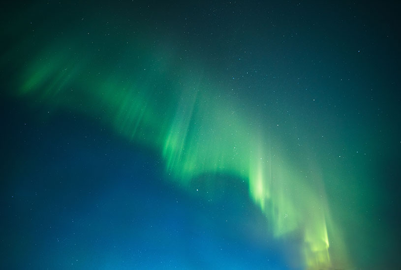 The Northern lights captured against the night sky.