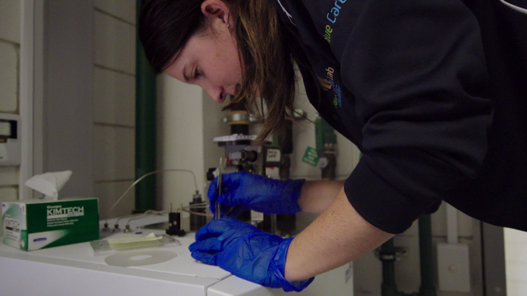 Katy Limpert running tests in a lab.