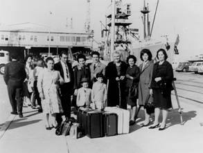 A migrant family arriving at Station Pier, Melbourne.