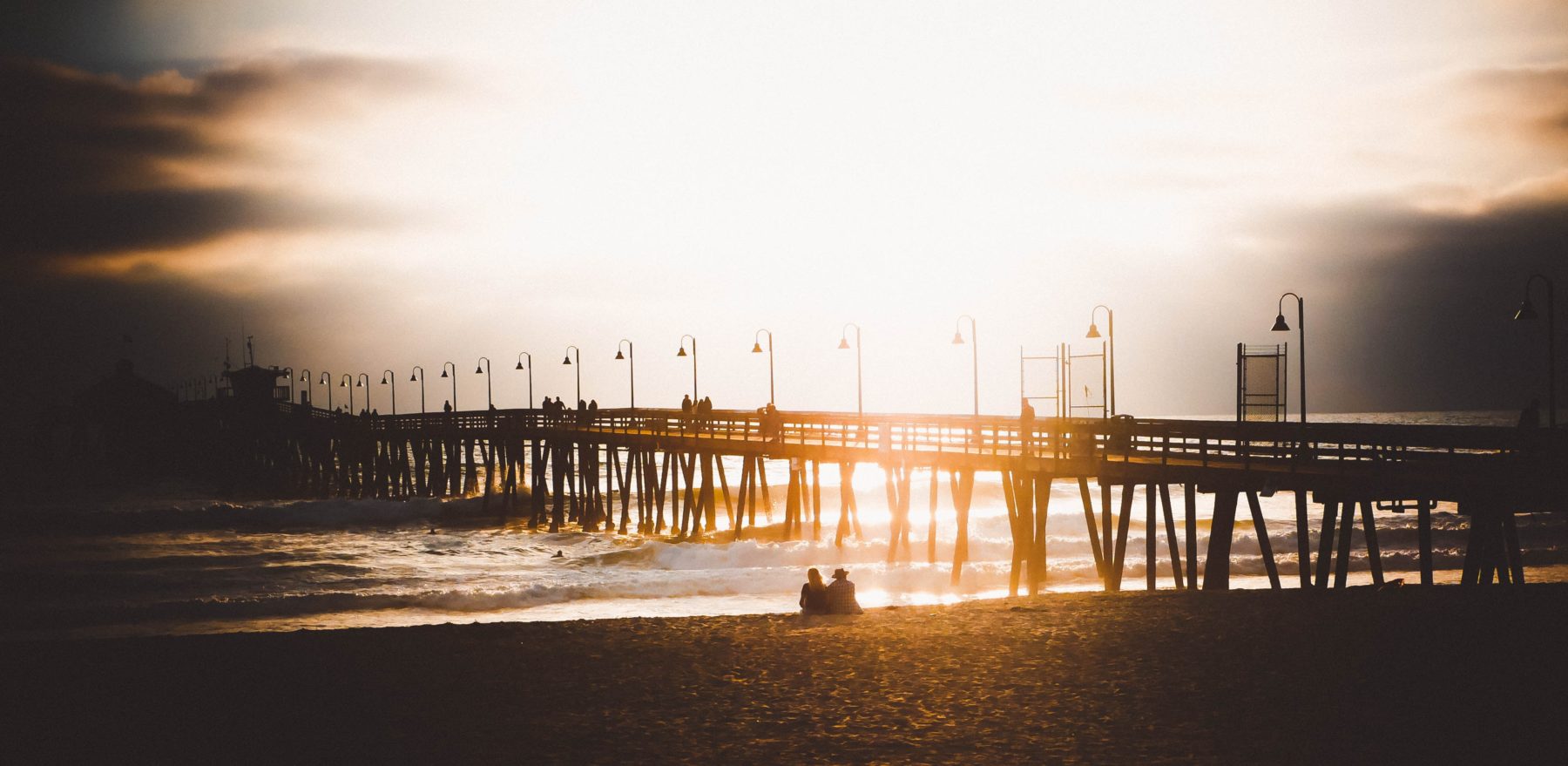 The sun setting over the pier at Imperial Beach, California.