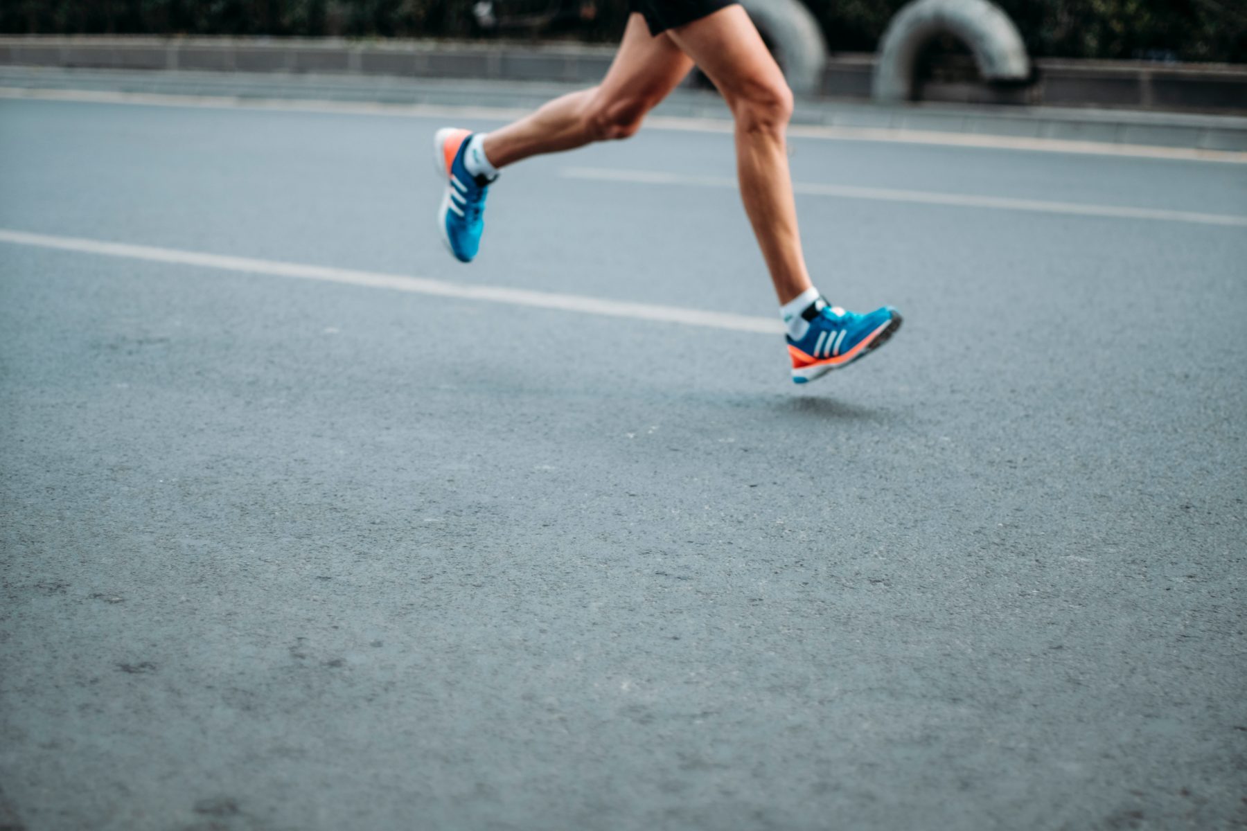 A close up of a person's legs while running.