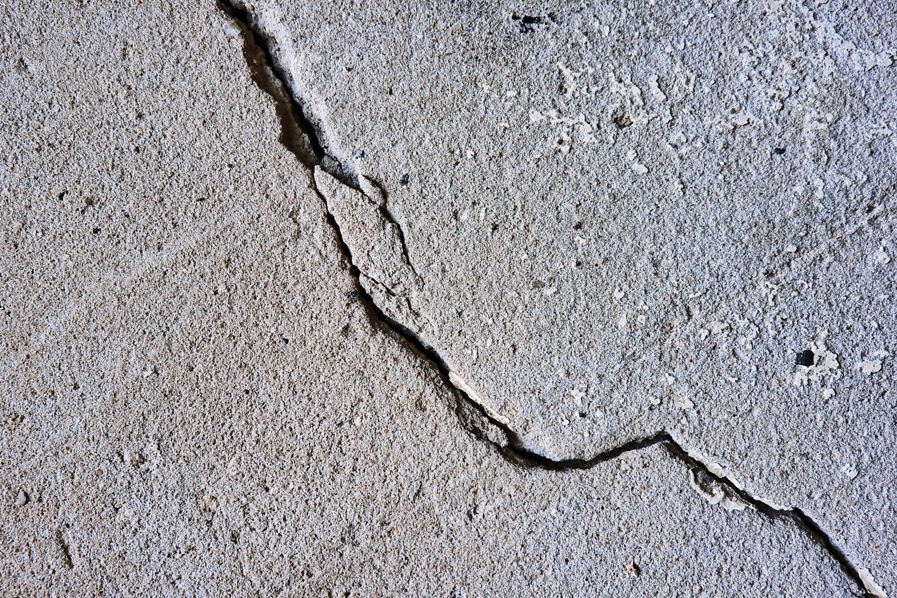 A crack in the ground after an earthquake.