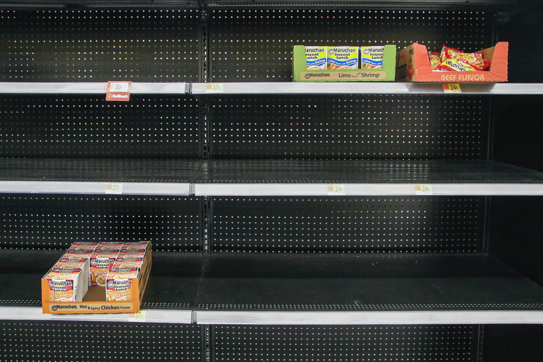 Image of empty shelves at a supermarket 
