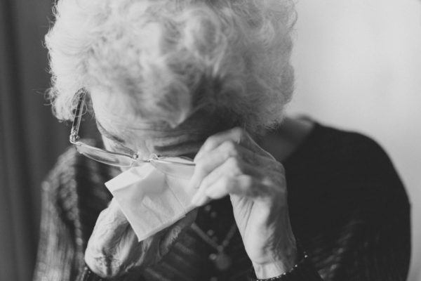 Image of sad elderly lady