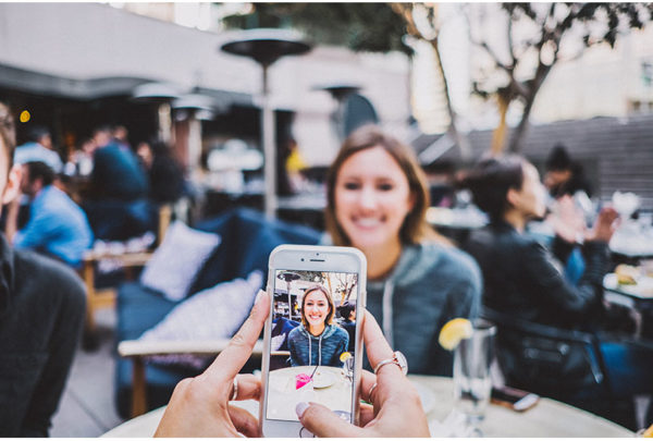 Image of a woman having her picture taken